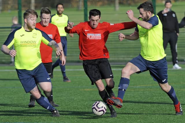 Wymering (red) v champions Harvest Home in the Mid Solent League in 2019/20. Picture Ian Hargreaves