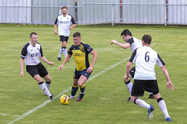 Fred Penfold (yellow/black) is one of a host of ex-Moneyfields players who have joined Clanfield. Picture: Mike Cooter