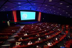 Cinema-goers take their seats for the matinee showing in the BFI Southbank cinema in London on May 17, 2021, as Covid-19 lockdown restrictions ease. (Photo by GLYN KIRK/AFP via Getty Images)