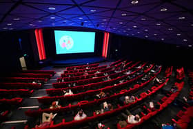 Cinema-goers take their seats for the matinee showing in the BFI Southbank cinema in London on May 17, 2021, as Covid-19 lockdown restrictions ease. (Photo by GLYN KIRK/AFP via Getty Images)