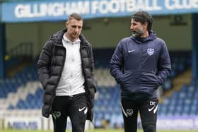Lee Brown, left, with Pompey boss Danny Cowley before kick-off at Gillingham     Picture: Jason Brown