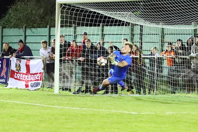 Luke Deacon saves Jamie Wrapson's penalty. Picture by Ken Walker