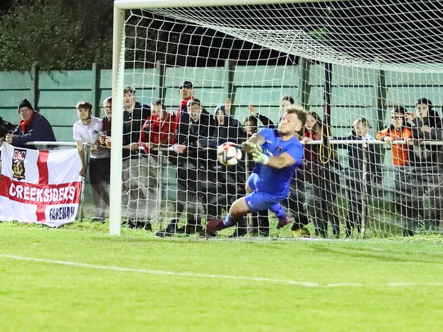 Luke Deacon saves Jamie Wrapson's penalty. Picture by Ken Walker