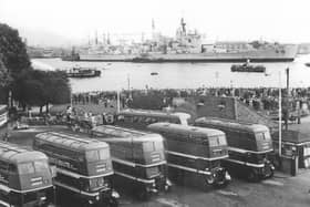 Seen from the Gosport side of Portsmouth Harbour, HMS Vanguard leaves on her final voyage. Picture: Barry Cox collection