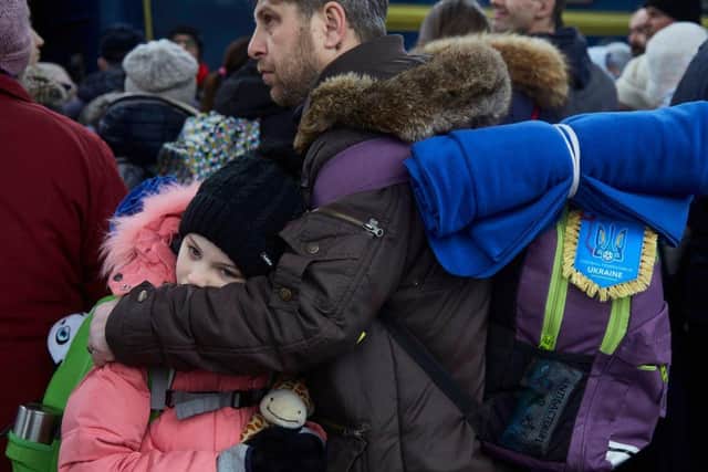 KYIV, UKRAINE - MARCH 02: Local residents wait to board a evacuation train to western regions on March 2, 2022 in Kyiv, Ukraine. Russian forces continued their advance on the Ukrainian capital as the country's invasion of its western neighbor entered its seventh day. Intense battles are also being waged over Ukraines other major cities. (Photo by Pierre Crom/Getty Images)