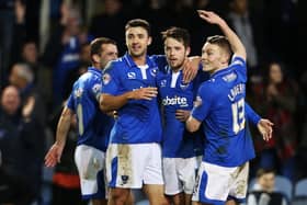 Marc McNulty celebrates with Enda Stevens and Caolan Lavery during his November 2015 hat-trick against York. Picture: Joe Pepler