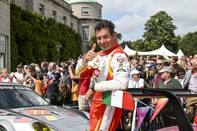 A driver at the celebration of 75 years of Porsche at the Goodwood Festival of Speed at Goodwood House in West Sussex. Picture date: Thursday June 13, 2023. PA Photo. This year, the event celebrates its 30th anniversary and takes place from June 13-16. 

John Nguyen/PA Wire.