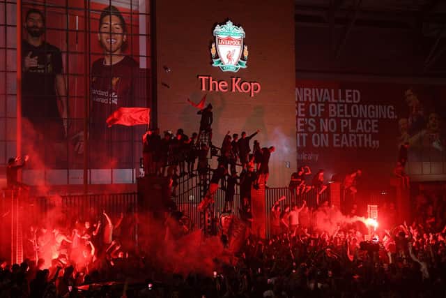 Liverpool fans celebrate after Jurgen Klopp's side won the Premier League title on Thursday. Picture:  OLI SCARFF/AFP via Getty Images