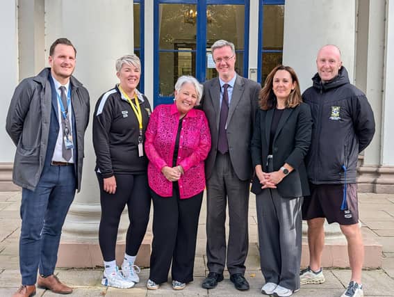 Dianne Howell with the Headteacher, Paul Foxley and the Senior Leadership Team