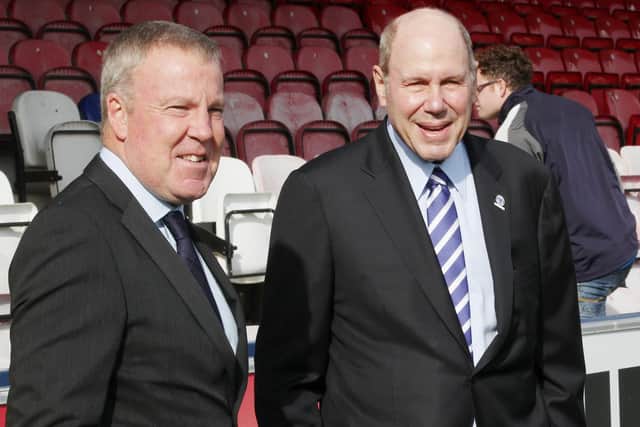Pompey boss Kenny Jackett, left, and chairman Michael Eisner. Picture: Joe Pepler
