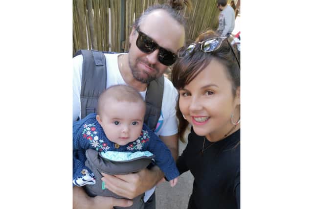Cheryl Gibbs, husband Matt, and baby Harley at Marwell Zoo