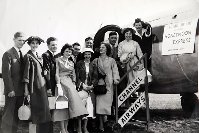 Gordon and Pat Sears from Bridgemary pictured in The Evening News in 1958 (5th and 6th from the left) on their way to Jersey for their honeymoon from Portsmouth Airport.
