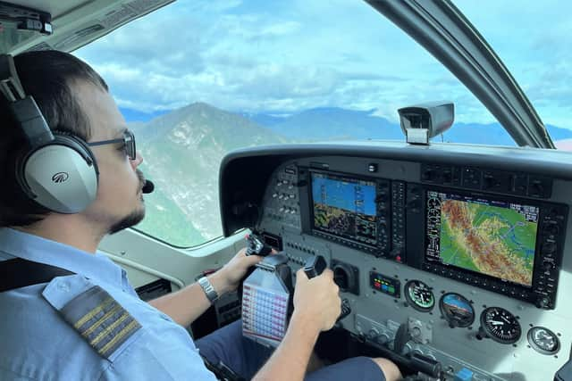 MAF aircraft landed at 20 airstrips across Papa New Guinea. Pictured is Ryan Cole flying a Cessna Caravan aircraft on the aid mission.