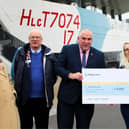 Portsmouth Depot Manager, Colin Ashcroft hands £3990 cheque to the Royal British Legion