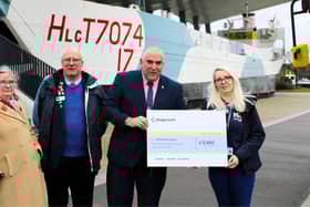 Portsmouth Depot Manager, Colin Ashcroft hands £3990 cheque to the Royal British Legion