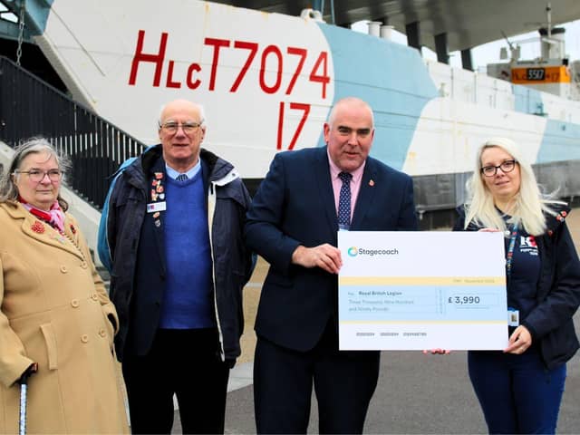 Portsmouth Depot Manager, Colin Ashcroft hands £3990 cheque to the Royal British Legion