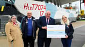 Portsmouth Depot Manager, Colin Ashcroft hands £3990 cheque to the Royal British Legion