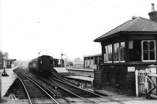 A Waterloo-bound train passing through temporary platforms at the western end of Havant station which was being rebuilt,1937. Picture: Barry Cox collection.