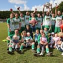 Mob Albion celebrate with their families after retaining the Father Purcell Challenge Cup. Picture: Kevin Shipp