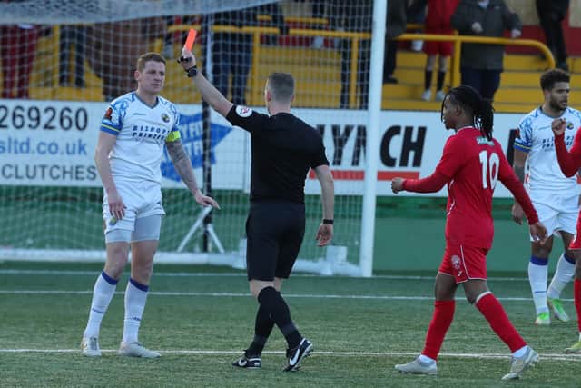 Joe Oastler is shown a red card. Picture by Dave Haines