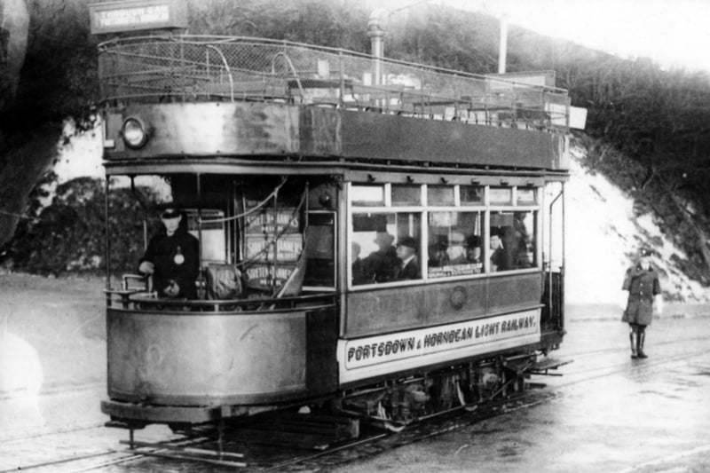 On the summit of Portsdown Hill outside the George pub a car from Horndean is about to descend to Cosham.