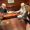 Chris Illman (far right) playing a game of Wetherspoons The Game with friends. The Facebook group has gained more than 300,000 followers in the last month.