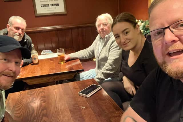 Chris Illman (far right) playing a game of Wetherspoons The Game with friends. The Facebook group has gained more than 300,000 followers in the last month.