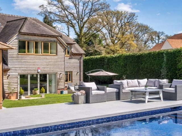 This property comes with five bedrooms, three bathrooms and six reception rooms as well as a swimming pool and huge garden. The listing says: "Four Oaks is an impressive and individual detached family home enjoying an excellent semi-rural position on the edge of the village with many walks right on the doorstep." The listing says: "The property offers impressive accommodation with spacious, light and airy rooms extending to about 3600 sq.ft." The listing says: "The property enjoys a quiet location at the end of Pardown, a no-through lane and sought after address on the edge Oakley, a popular village on the western edge of Basingstoke." This property is on the market for £1,850,000 and it is being sold with Knight Frank - North Hampshire Sales. For more information about the property, visit the website. This home has a gym, a swimming pool, outbuildings, parking, a paddock and a home office.