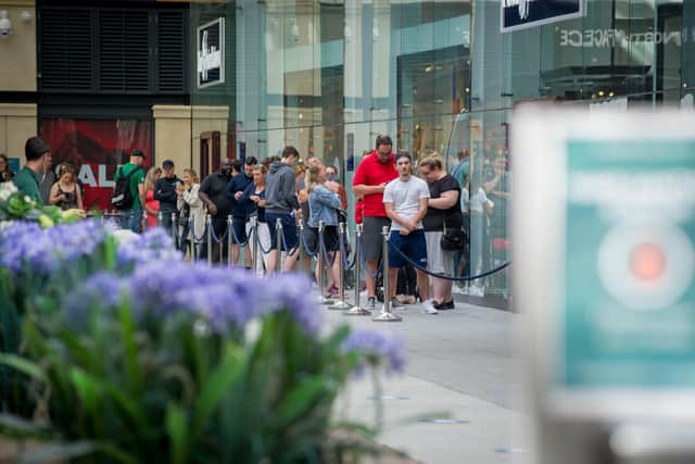 Gunwharf Quays opens on Monday 15 June 2020 with social distancing measures in place.
Pictured: Queues outside Ralph Lauren.
Picture: Habibur Rahman