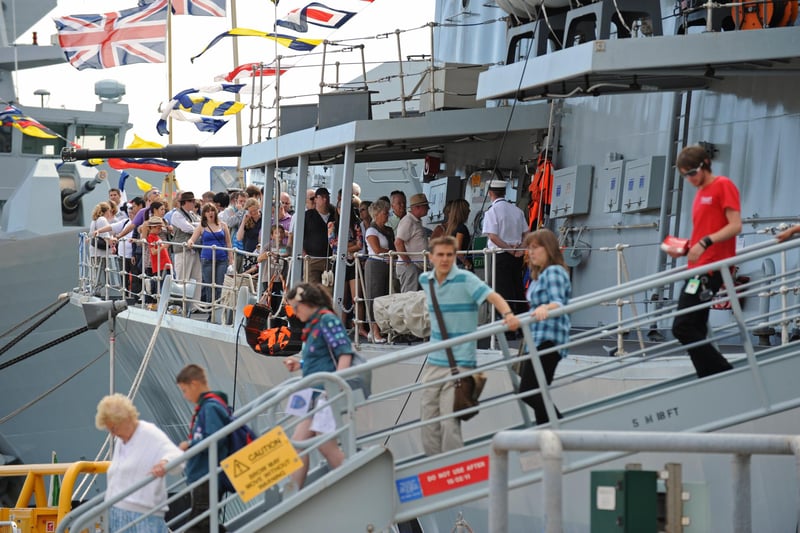 So many people wanted to go on board the ships that were alongside for the three day event especially with a long wait to view the bridge area of HMS Westminster. 1st August 2010. Picture: Malcolm Wells 102438-851