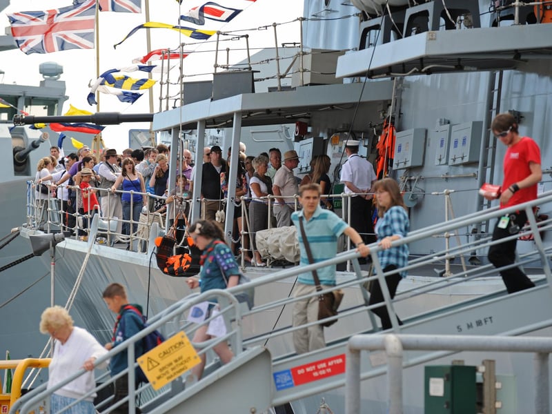 So many people wanted to go on board the ships that were alongside for the three day event especially with a long wait to view the bridge area of HMS Westminster. 1st August 2010. Picture: Malcolm Wells 102438-851