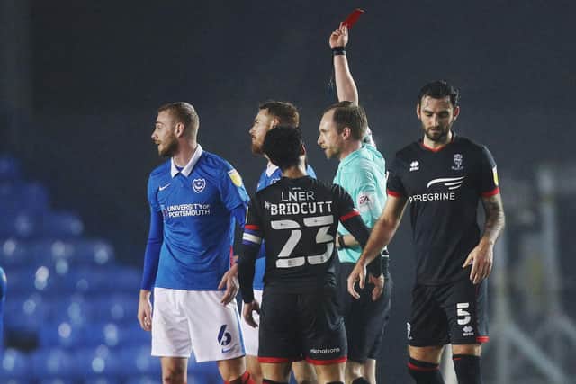 Jack Whatmough was given a straight red card in Pompey's defeat to Lincoln. Picture: Joe Pepler