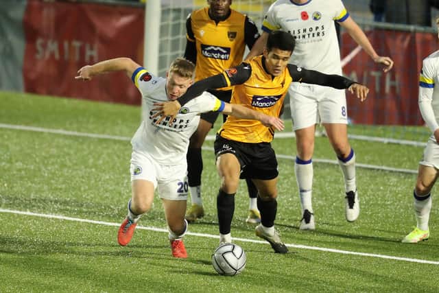 Maidstone (yellow/black) in action during their recent 0-0 National League South draw at Havant & Waterlooville.  Picture by Dave Haines.
