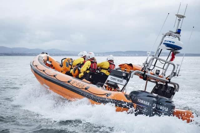 An RNLI lifeboat heads out to sea.