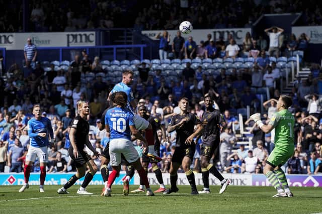 Ryan Tunnicliffe heads over for Pompey, yet turned in a man-of-the-match performance in Saturday's 2-0 success over Crewe. Picture: Jason Brown/ProSportsImages