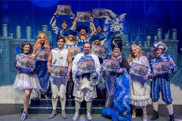 Panto cast of Hook at The Kings Theatre with Destination Portsmouth board game