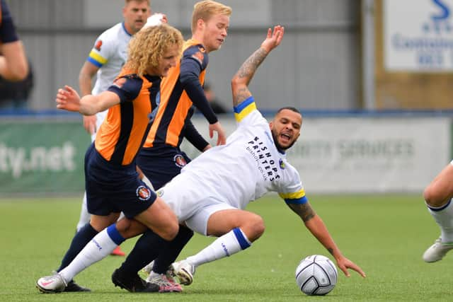 Recurring theme: Slough Town midfielder Aaron Kuhl, left, was on target from the penalty spot as his team took an early 2-0 lead at Westleigh Park in October. Picture: Martyn White