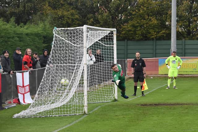 Fareham score one of their three penalties against Badshot Lea. Pic: Paul Proctor.