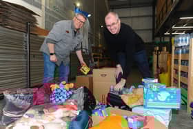 Pictured is: (l-r) Terry Buckel (50) and Steve Holland (55) with just a handful of the supplies which have been donated.
Picture: Sarah Standing (040322-217)