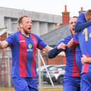 Harry Birmingham (second right) celebrates after US Portsmouth scored a late second goal in their Vase quarter-final win against Flackwell Heath. Picture: Martyn White.