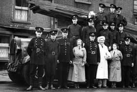 Auxiliary firemen and canteen staff pose with their appliance possibly in London Road. 
Picture: George French collection