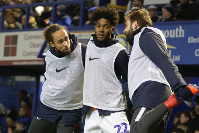 Ellis Harrison, centre, with team-mates Marcus Harness and Brett Pitman.  Picture: Robin Jones