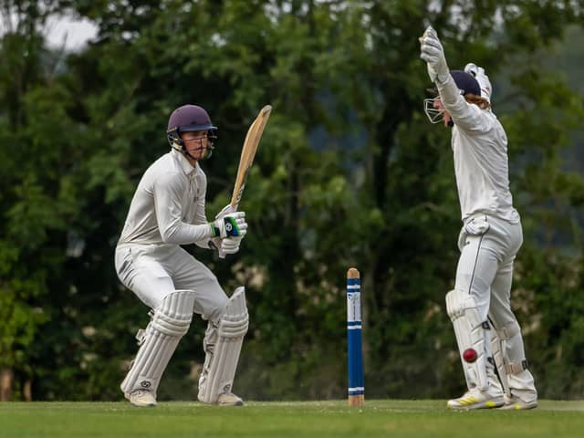Hambledon record-breaker Matt De Villiers is trapped leg before by Archie Reynolds. Picture: Mike Cooter