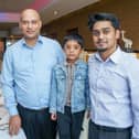 Gandhi Indian restaurant in Portsmouth has recently been taken over by Ash Haque and has undergone a renovation. A new menu has also been launched as part of the take over. Pictured: Owner Ash Haque with his son, Riaz 4 and Ash's brother RayanPicture: Habibur Rahman