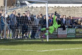 Fareham keeper Luke Deacon fails to keep out this Bradford penalty. Picture by Ken Walker
