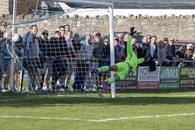 Fareham keeper Luke Deacon fails to keep out this Bradford penalty. Picture by Ken Walker