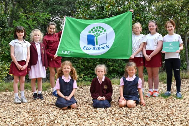Pictured: The prep school eco team celebrate their Eco-Schools Green Flag Award