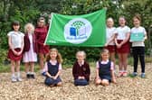 Pictured: The prep school eco team celebrate their Eco-Schools Green Flag Award