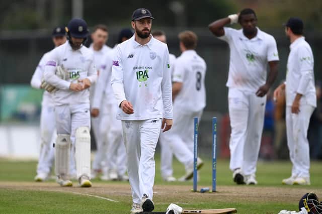 A glum Hampshire captain James Vince leaves the field after his side's dramatic one-wicket loss at Liverpool. Photo by Gareth Copley/Getty Images.