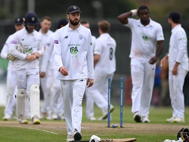 A glum Hampshire captain James Vince leaves the field after his side's dramatic one-wicket loss at Liverpool. Photo by Gareth Copley/Getty Images.